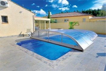 Abri de piscine bas télescopique en aluminium et polycarbonate